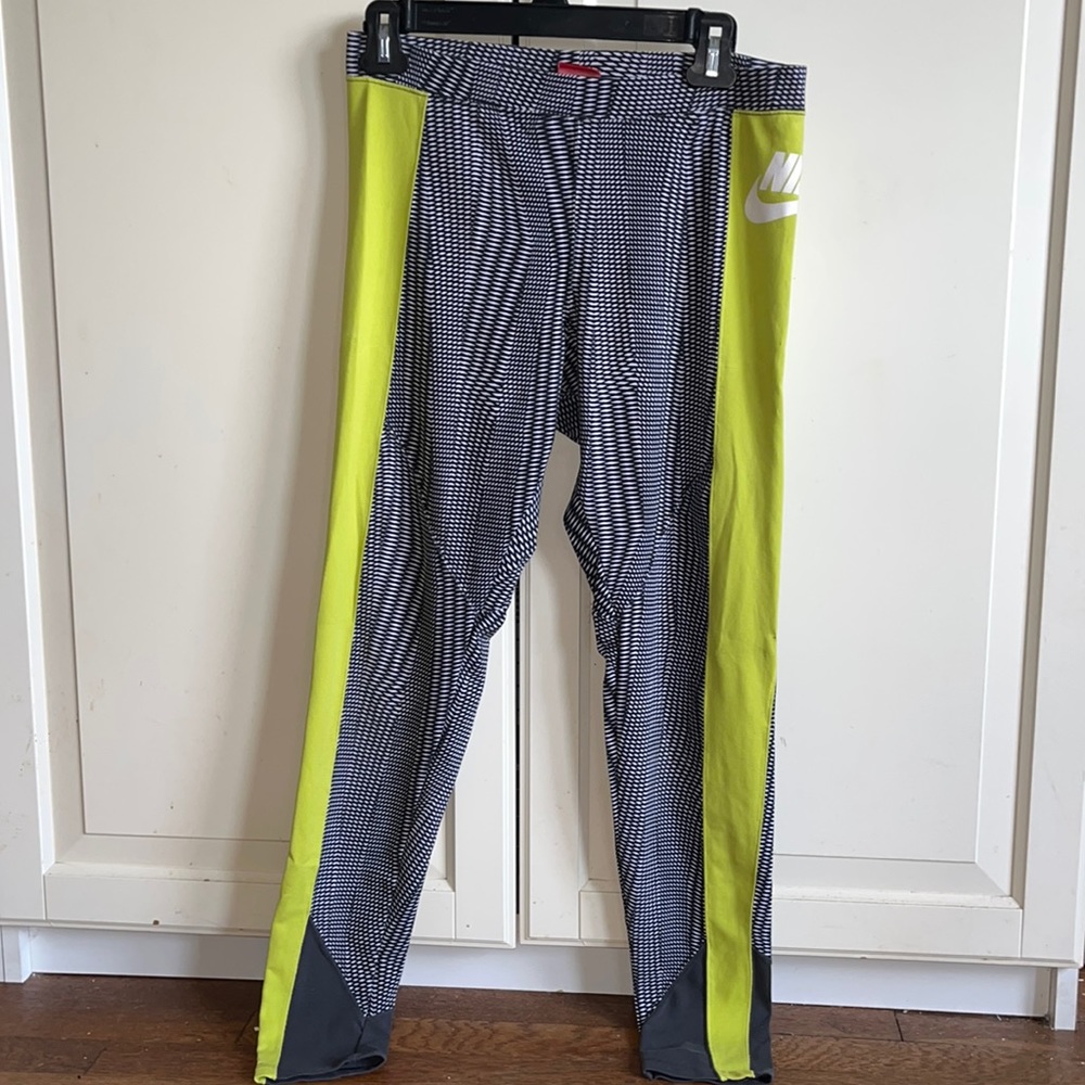 Nike workout leggings with neon yellow side panels